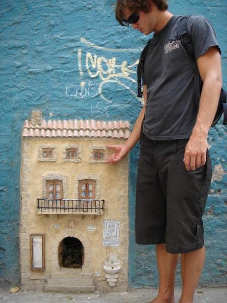 Check out the Spanish styled cat door