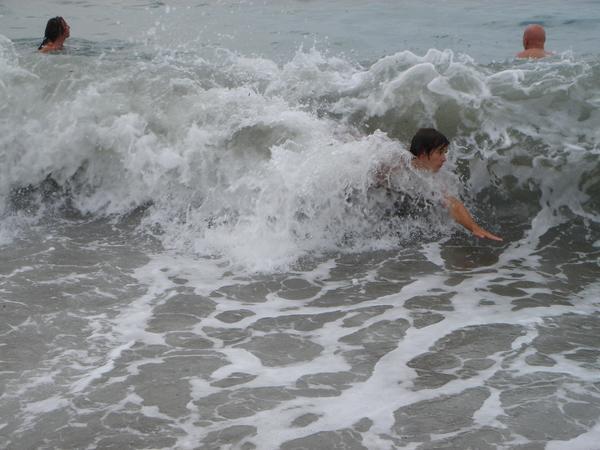 Tiimy B catching a shore breaker