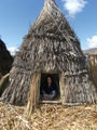 Maire in one of the Reed Huts on the Floating Islands, Lake Titicaca