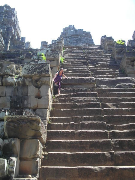 Maire walking down the steps of one of the many Angkor Temples outside Siem Reap