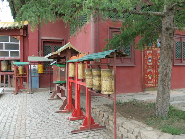 prayer wheels at the temple