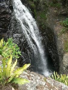 Waterfall above Natural Arch