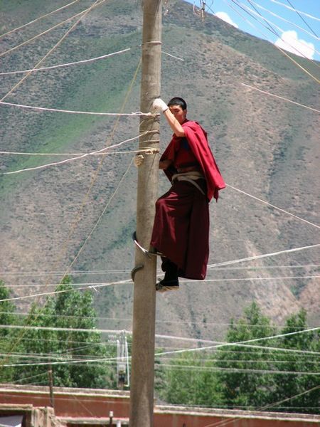 Monk electrician - note climbing shoes