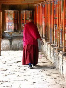 Prayer wheels and monk