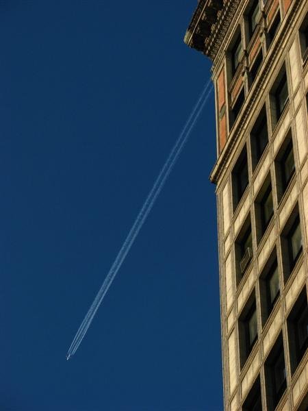 Contrail and building