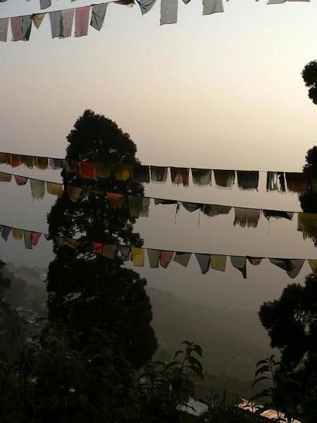 Prayer flags and morning mist