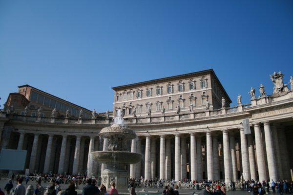 The very last window on the top floor, right, is where the Pope addresses the masses