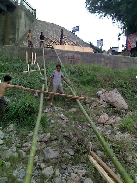 Modern logistics to get tons of bamboos,  wood and capets down to the boat