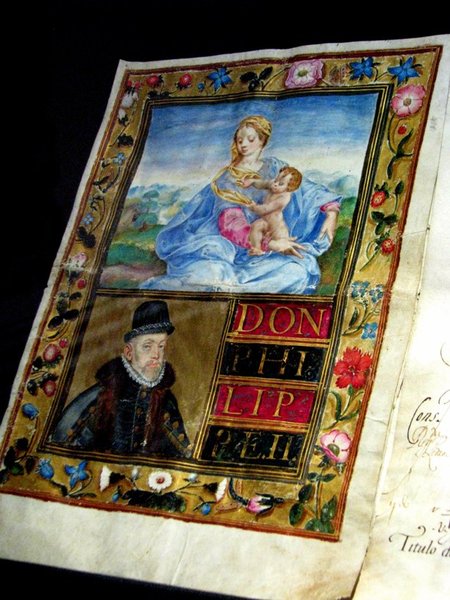 Decorated book with a grumpy looking Philip II