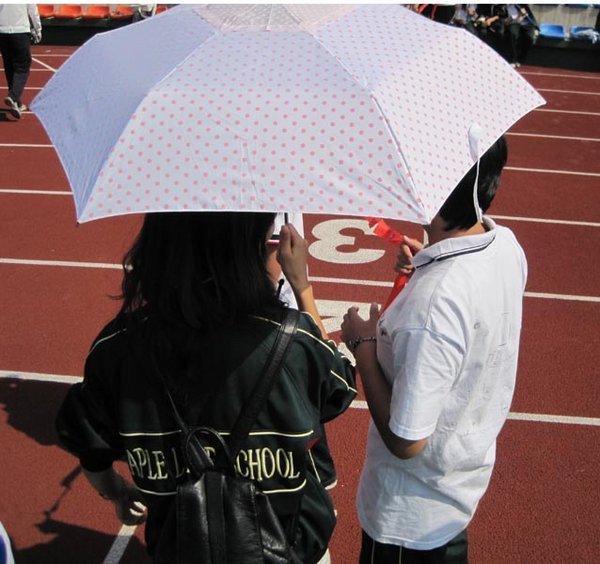 The umbrella is for sun, not rain
