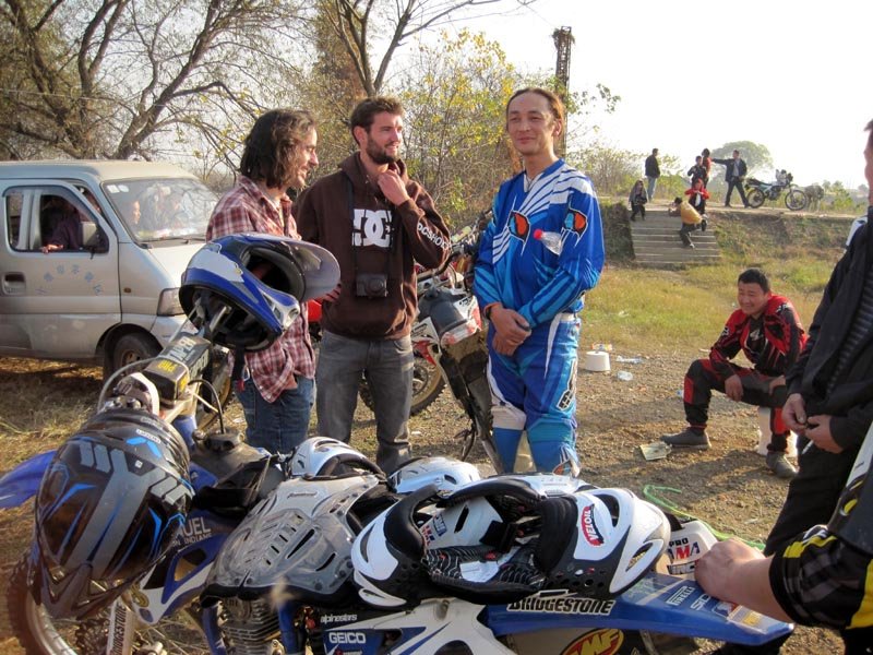 Bryn and Jason try to have a conversation with one of the riders
