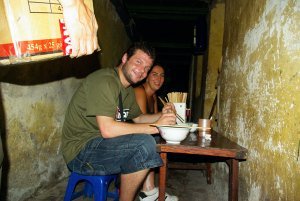 Leo and me eating Pho in an Alley