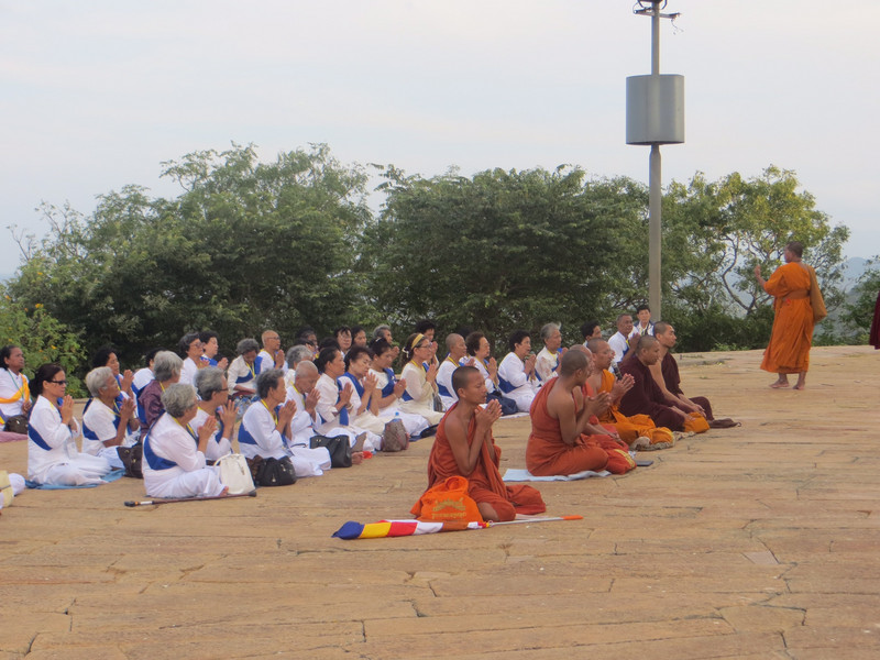 Monks and devotees praying at Ambasthale Dagoba 