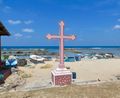 A colourful Christian cross on the beach, Point Pedro