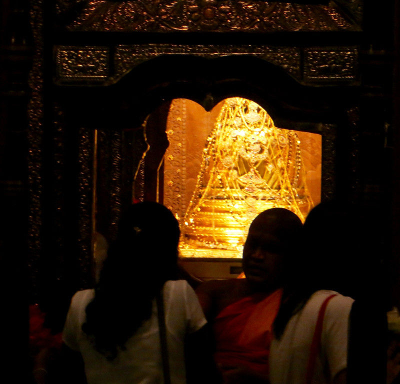 The golden Dagoba shaped casket within the Temple of the Sacred Tooth Relic.