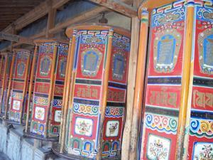 Wooden prayer wheels at Labrang Monastery