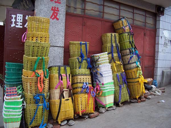 The baskets  that are carried by the local people on their backs.