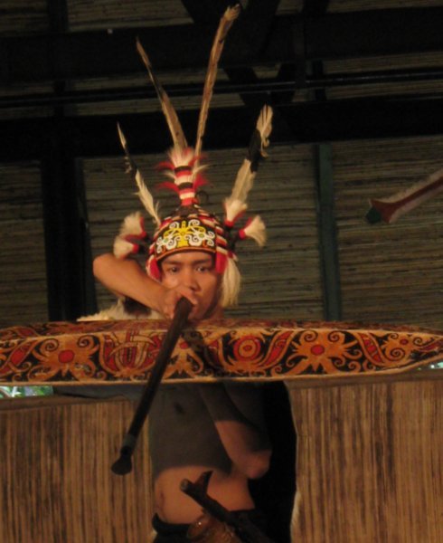 Blowpipe dancer at the Cultural Village