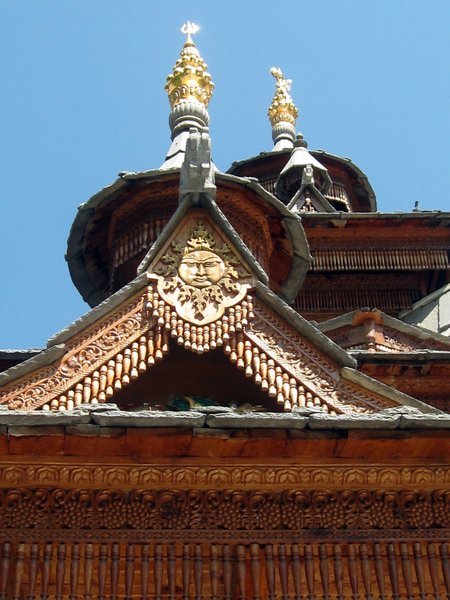 Temple roof in Baseri with sun symbol