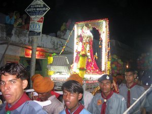 Carrying the Teej Idol through the streets