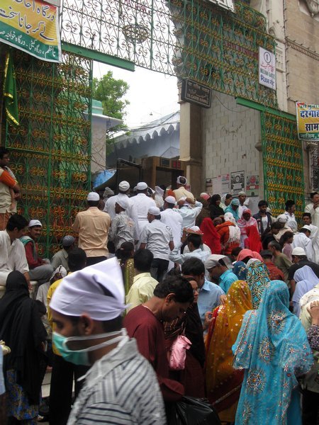 Crowds at front gate of mosque complex