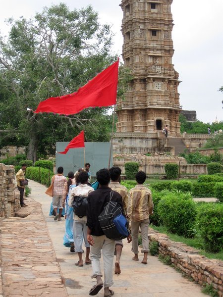 Pilgrims at the Victory Tower within the fort