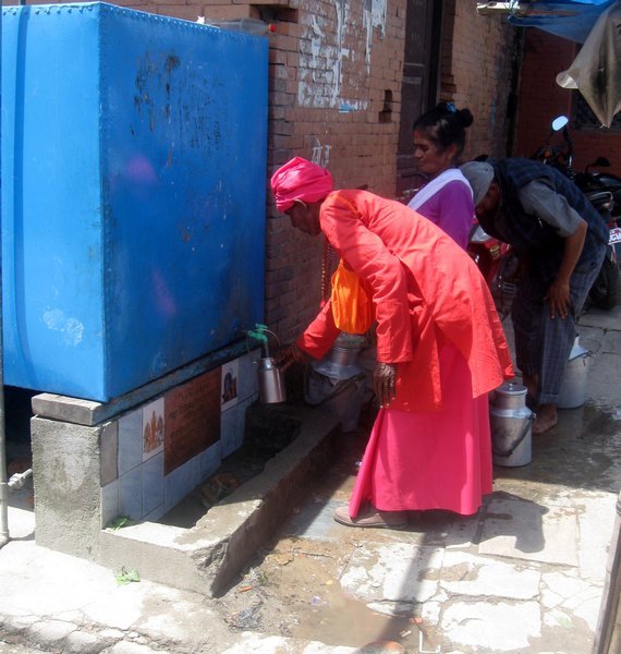 Pilgrim filling water container