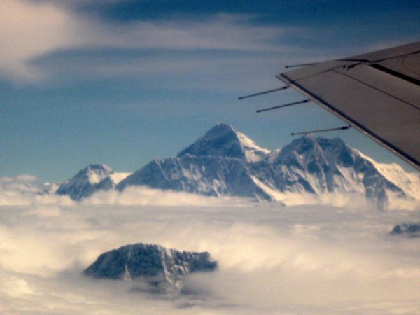 The summit of Mt Everest above the clouds