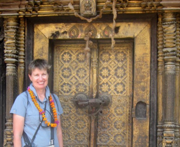 Linny standing at a temple door in Patan