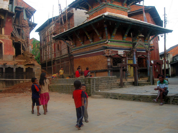 Happy children playing in main street of Bandipur