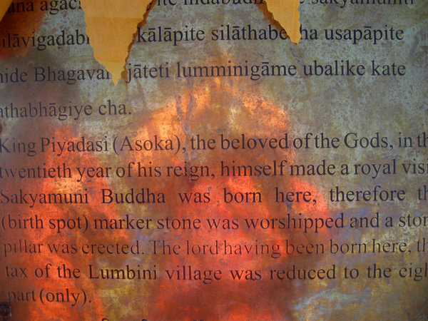 Sign showing Buddha's birthpalce in Lumbini