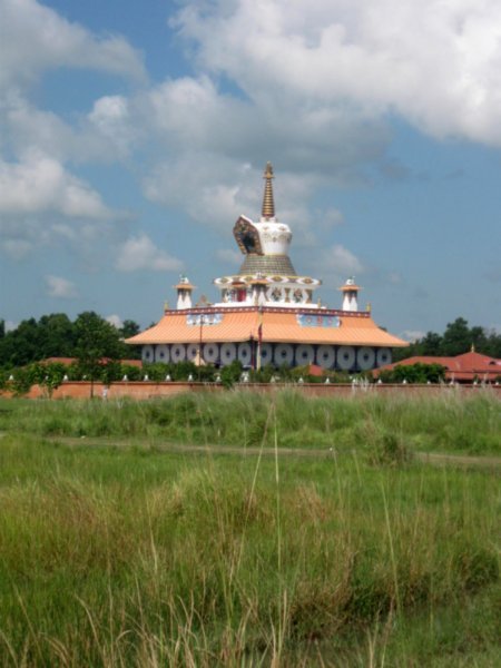Colourful temple surrounded by marsh lands