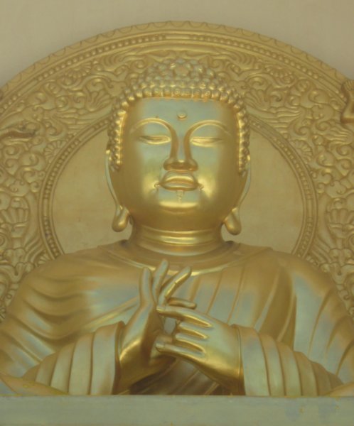 A golden Buddha at the Peace Pagoda