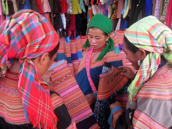 Buying fabric at the Lung Khau Nhin market.