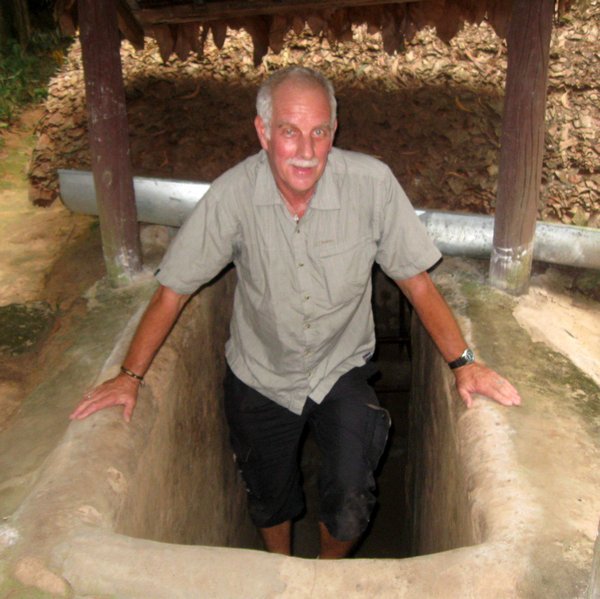 Jerry emerging from the Cu Chi tunnels