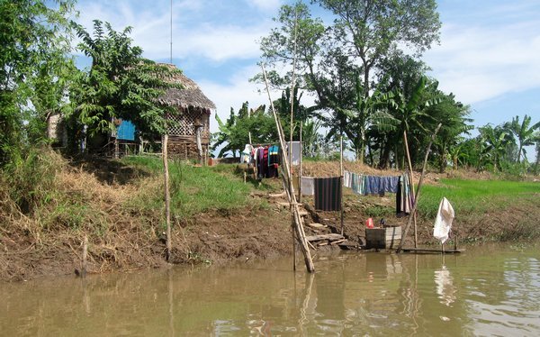 Typical river bank house, Mekong River 