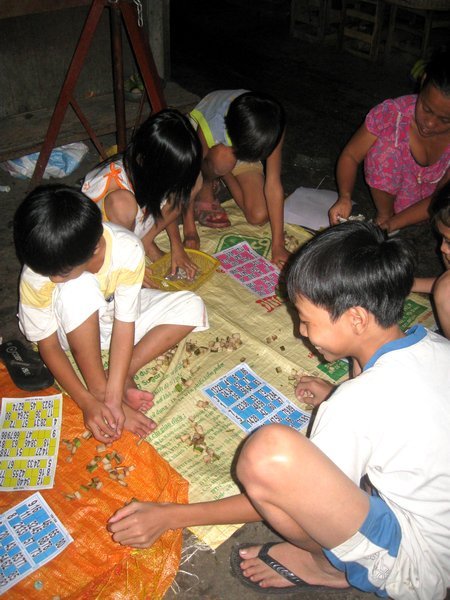 Children gambling at the market