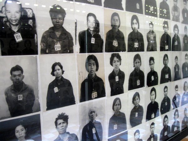 Photos of  some of the victims at the Tuol Sleng Museum