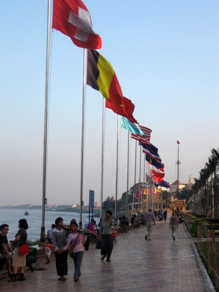 Flags of many nations line Sisowath Quay