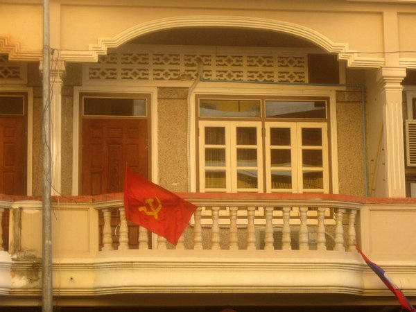 Flag from old French building in Pakse