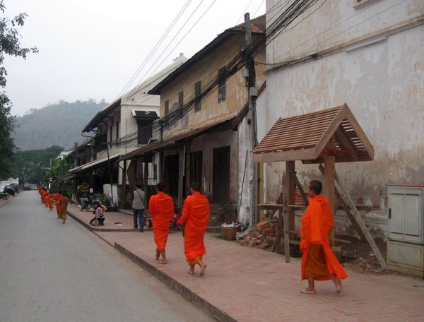 Monks in the main street in Luang Prabang