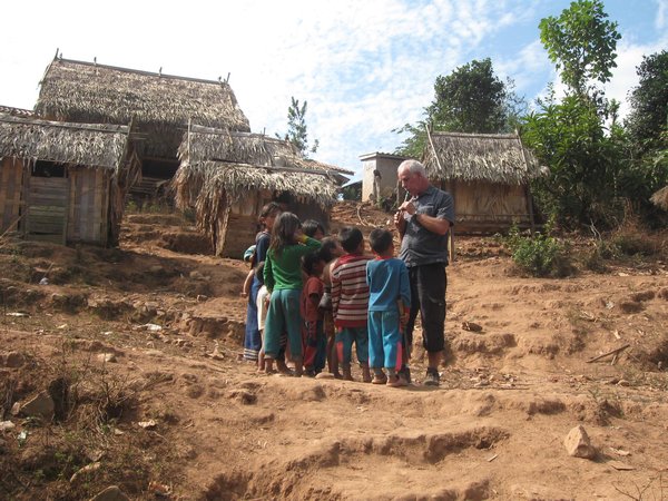 Jerry entertaining the village kids