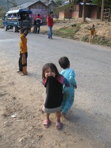 Curious child on road near Muang Sing
