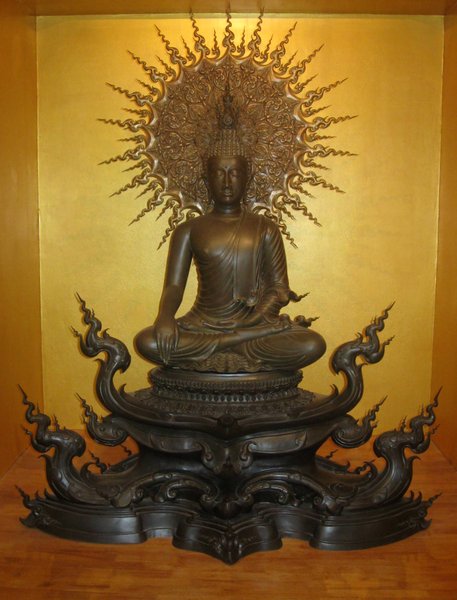Buddha bronze in museum gallery at the White Temple