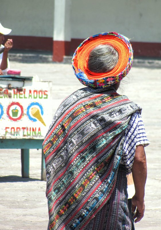 Old lady wearing traditonal hat - only saw elderly wearing them
