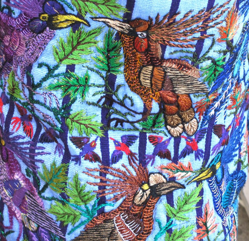 More embroidery detail on man's trouser leg