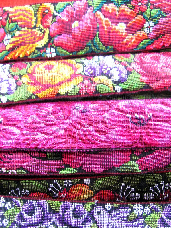 Embroidered strips of fabric worn around the womens waists
