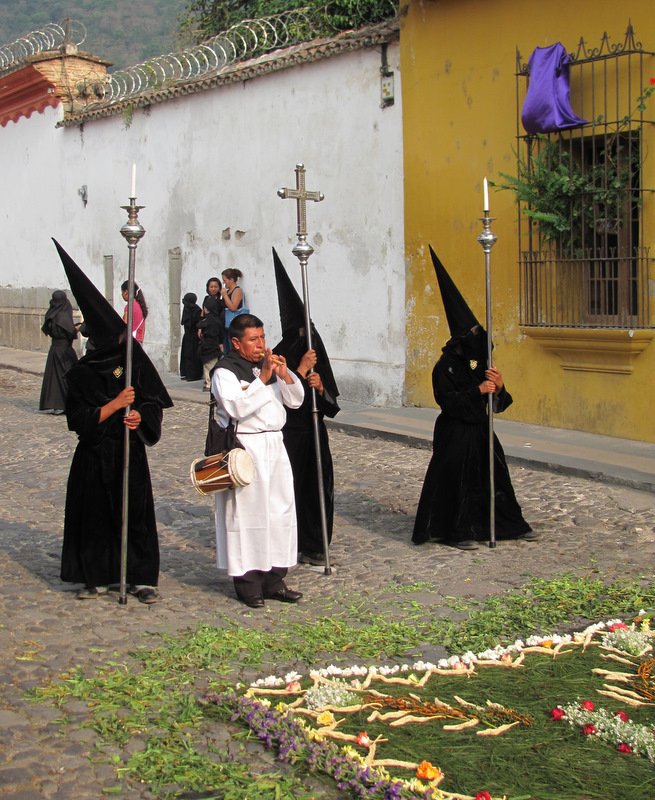 Hooded participants in Children's procesion