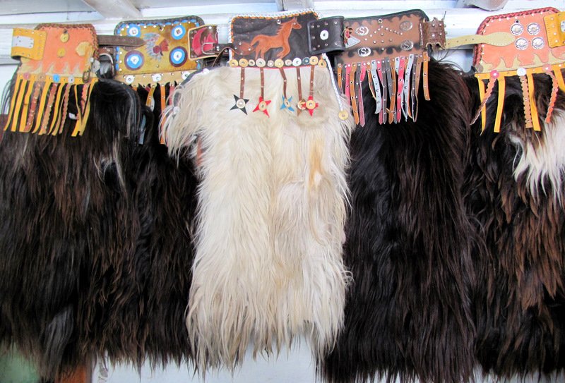 These 'cowboy' leg pieces are made from sheepskin and worn by all the men and boys during a week long carnival later in the year. They are made locally in a couple of shops which make only these.