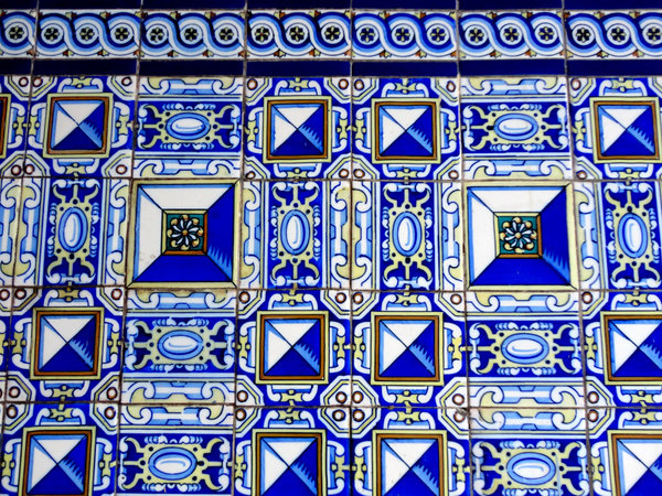 Blue and yellow tiles on walls at San CFrancisco Monastery